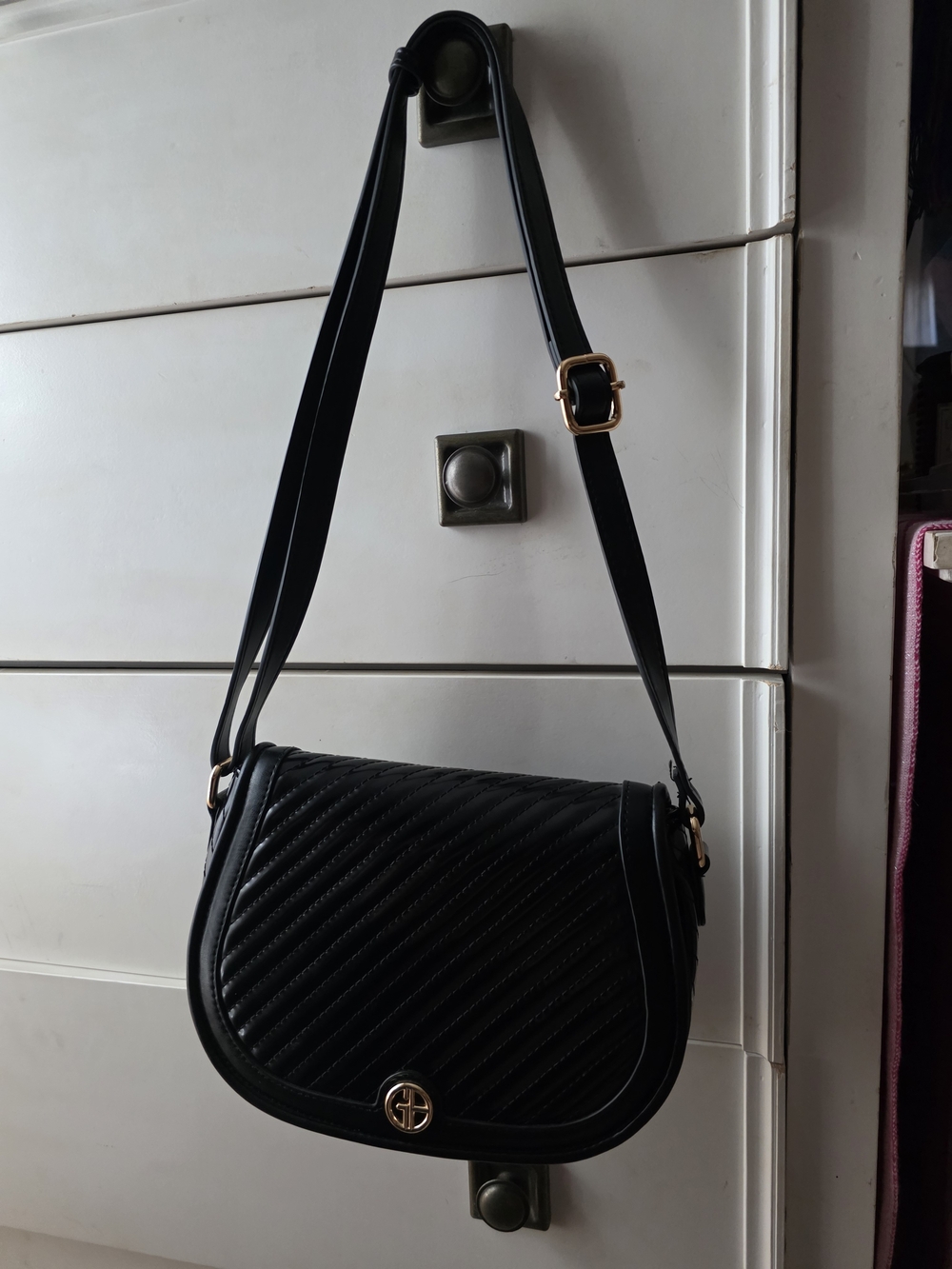 Quilted Crossbody Saddle Bag in Black